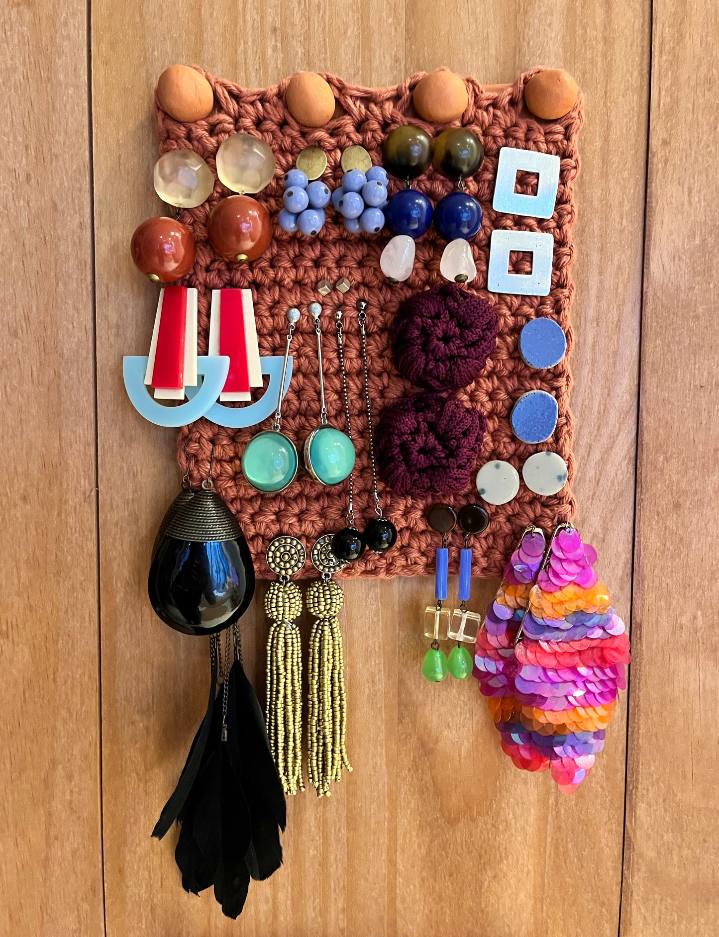 Ceramic and crocheted honeycomb earring organizer