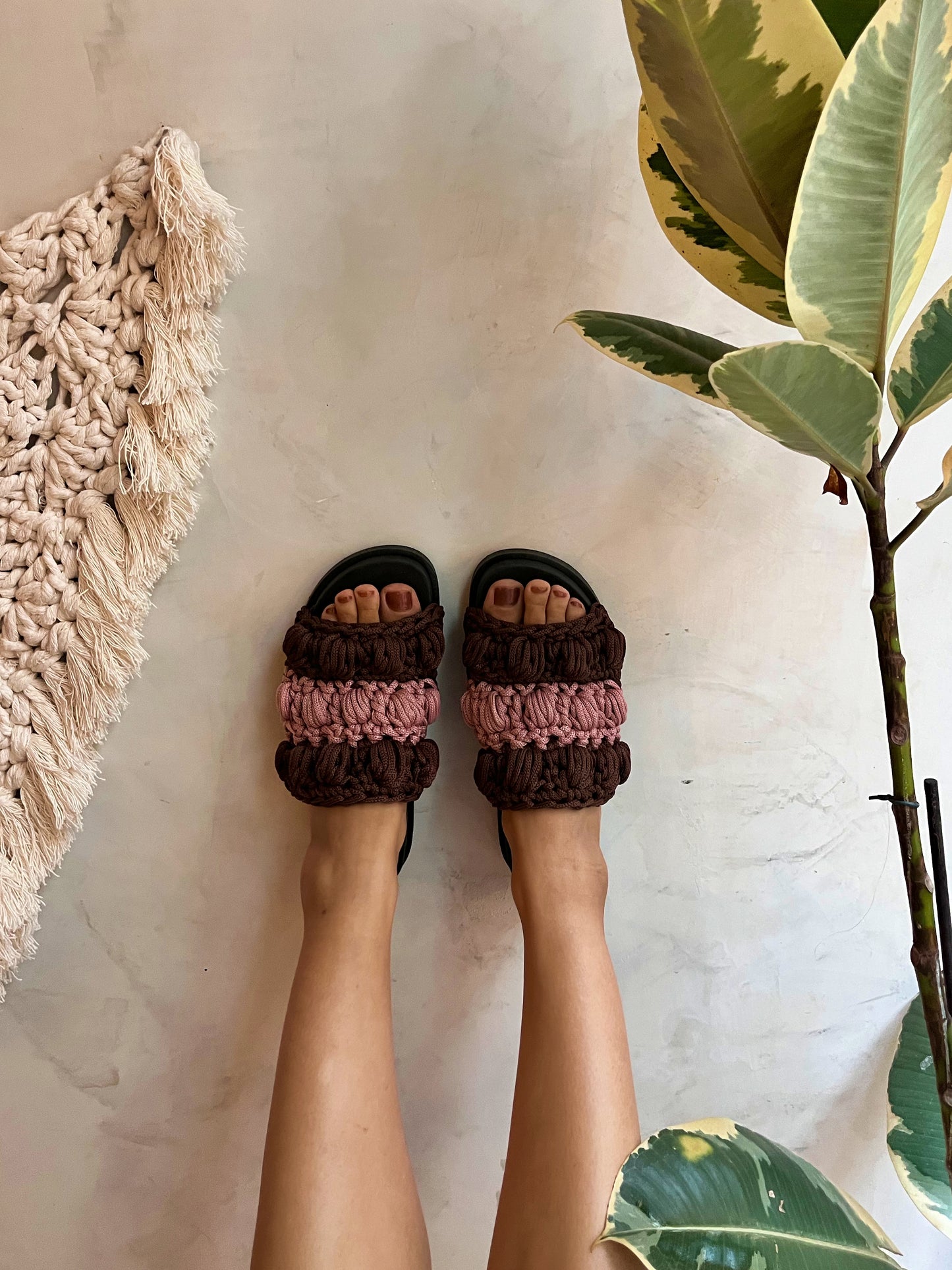crocheted sandals on the street, in the rain, on the two-tone farm