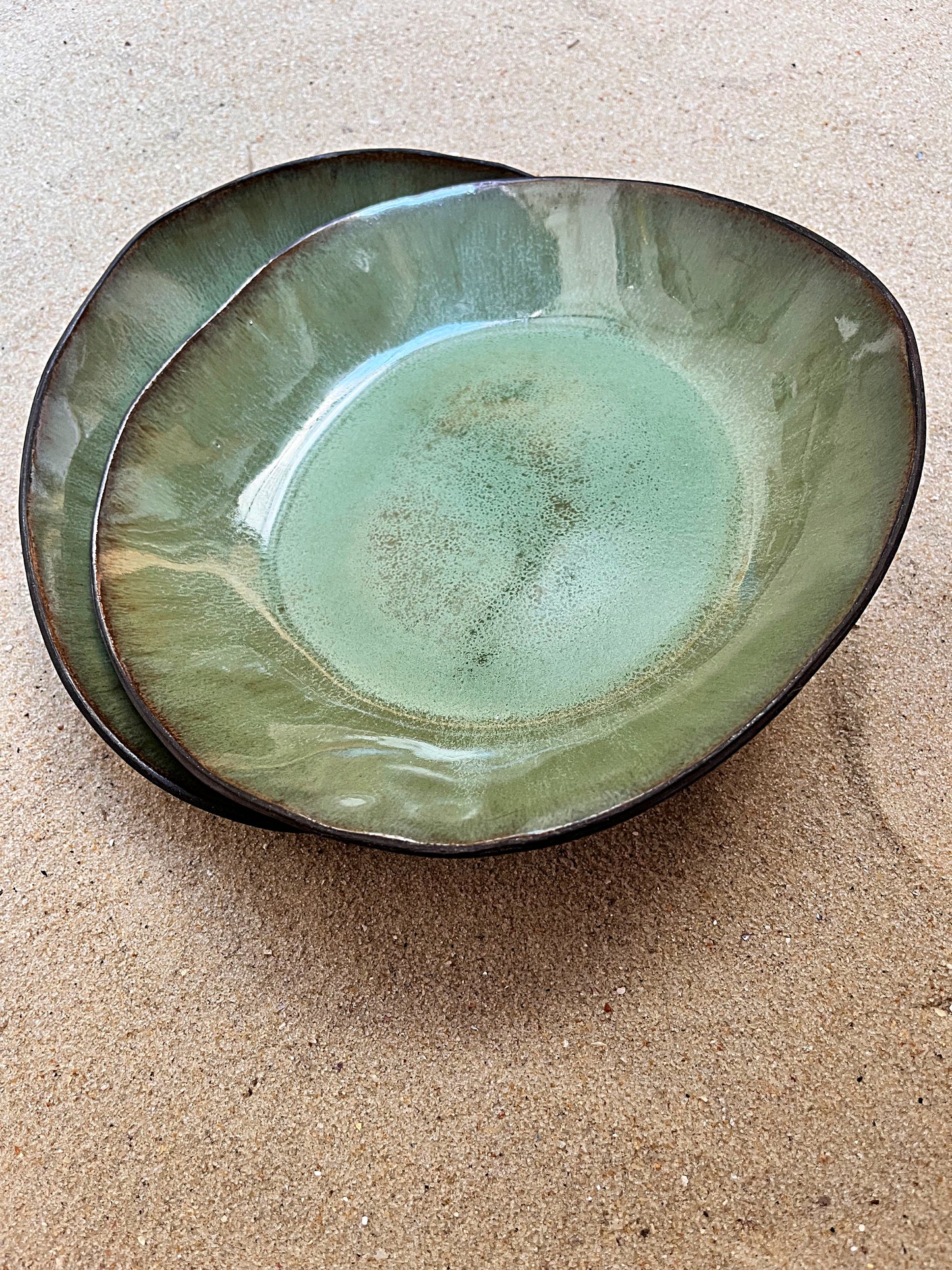 duo of olive deep plates