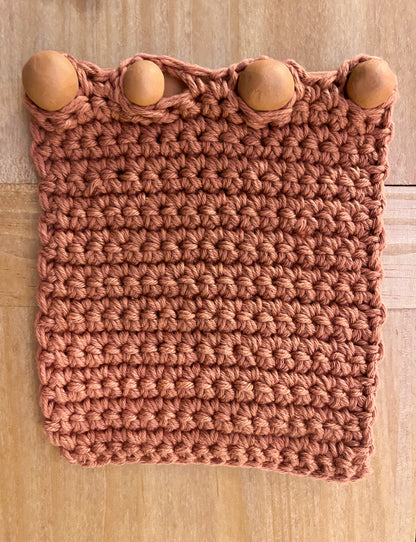 Ceramic and crocheted honeycomb earring organizer