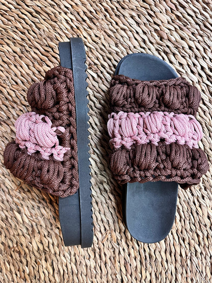 crocheted sandals on the street, in the rain, on the two-tone farm