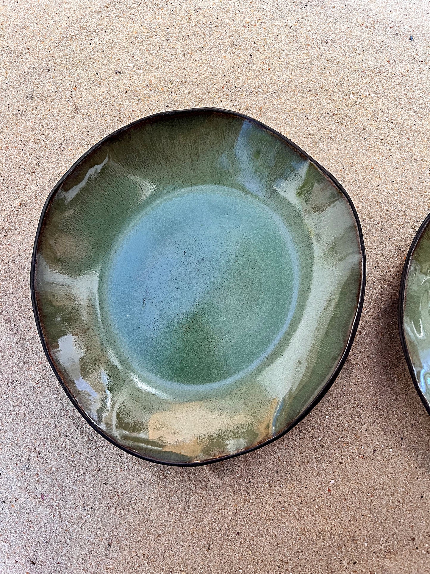 duo of olive deep plates