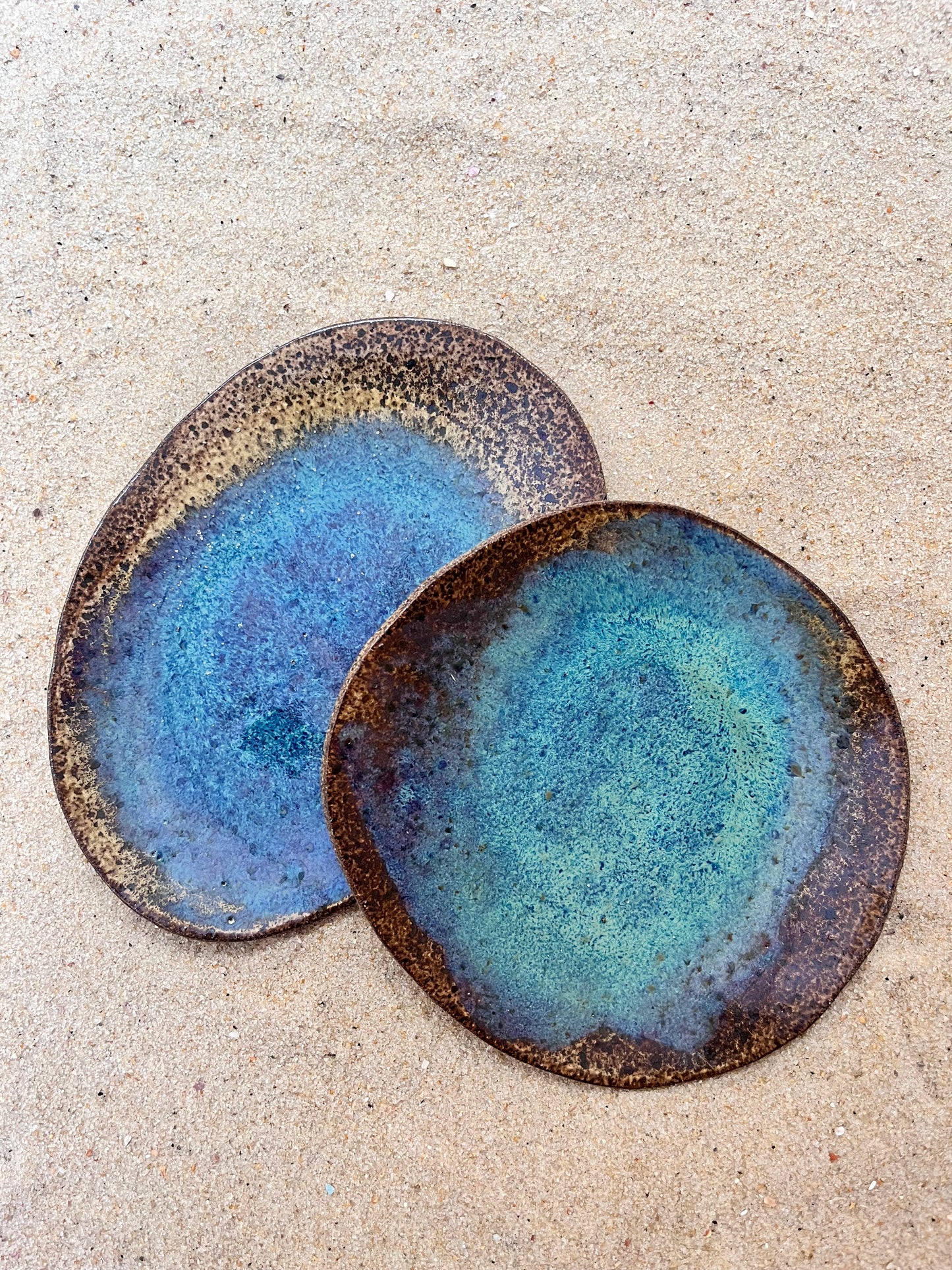 duo of small plates for snacking on sky and sun
