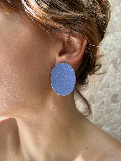 silver earring wind on the coast